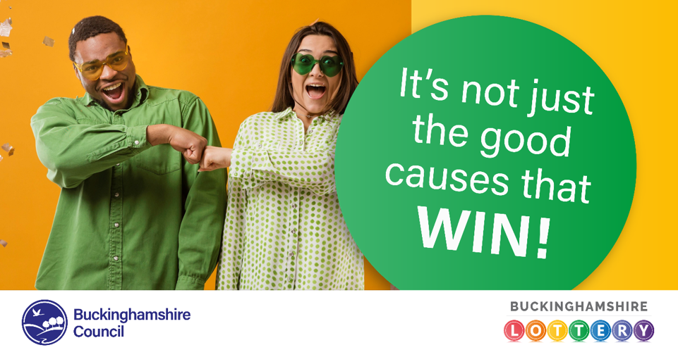 Two people celebrating a win on the Buckinghamshire Lottery